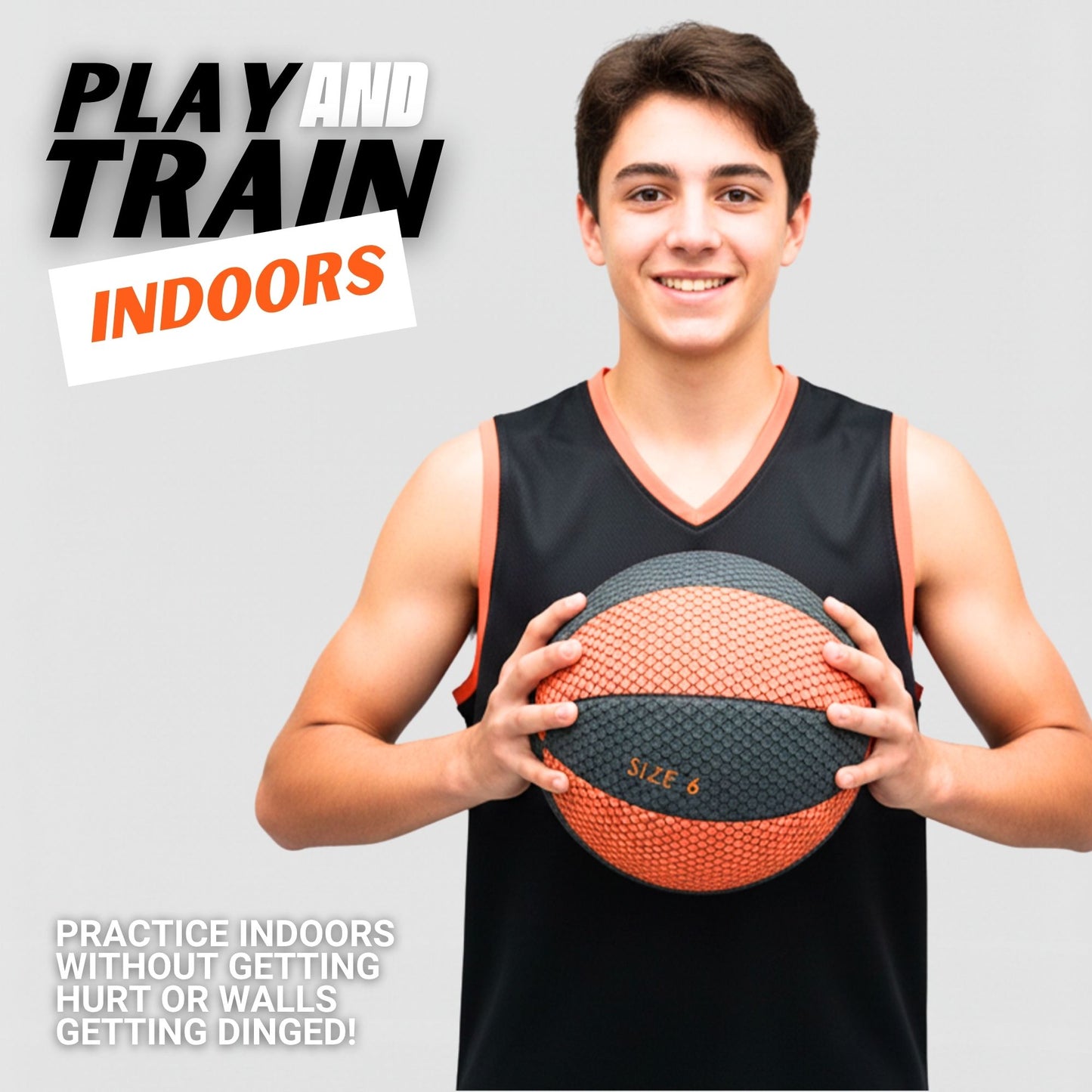 Person holding a basketball with promotional text about indoor play and training.