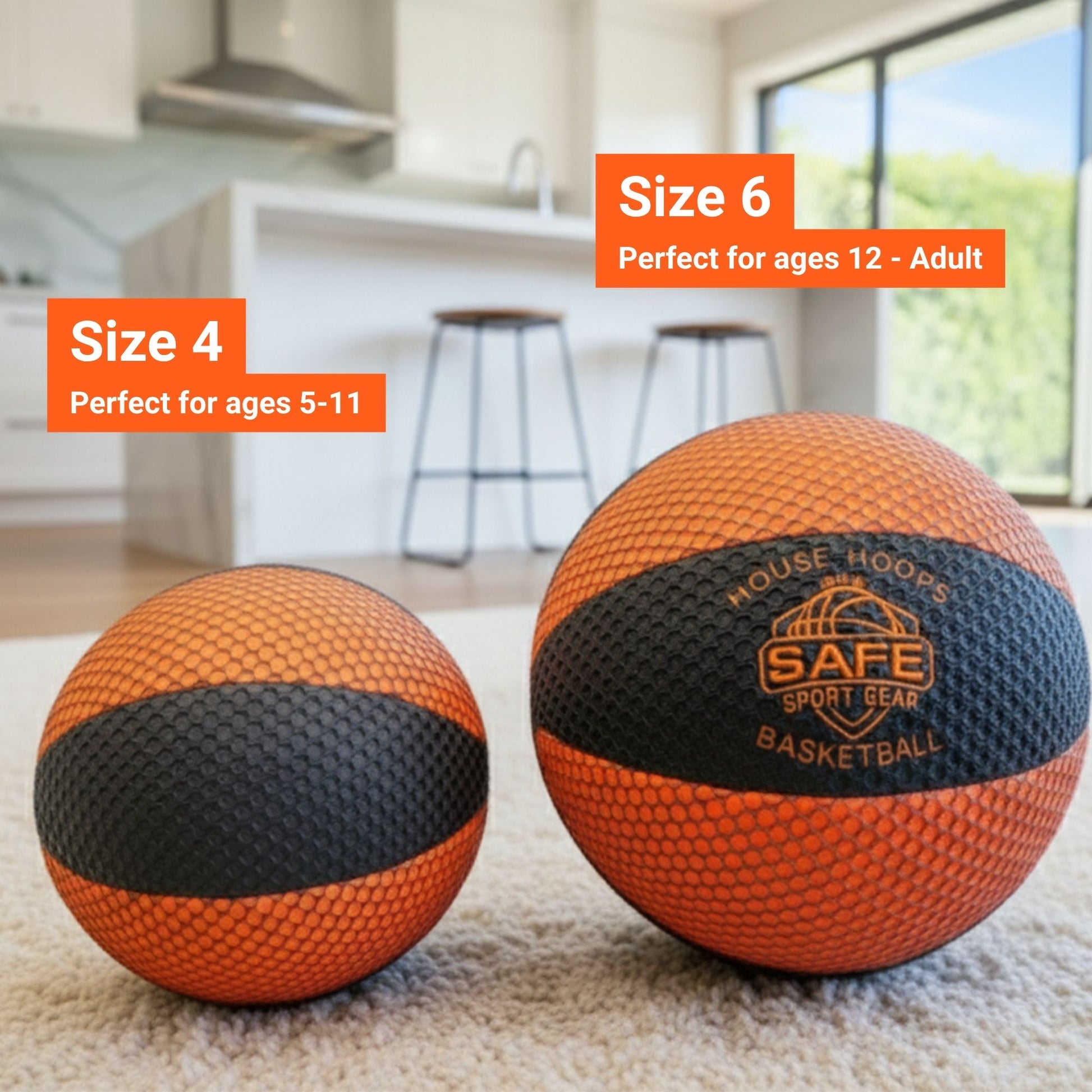 Two basketballs, one size 4 and one size 6, on a carpeted floor with a kitchen background.