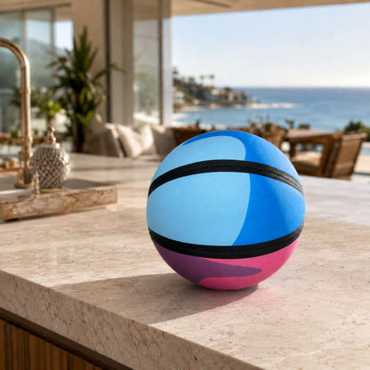 HouseHoops basketball - SH on a kitchen counter with a scenic view of water and buildings in the background.