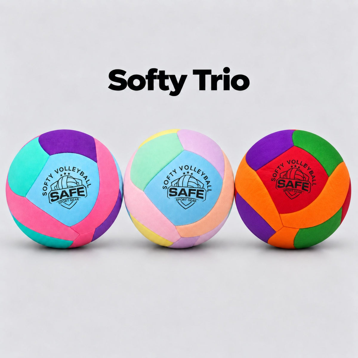 Three colorful Softy volleyballs labeled 'Softy Trio' on a light gray background, each with different pastel and bright color panels and the Safe Sport Gear logo printed on the front.